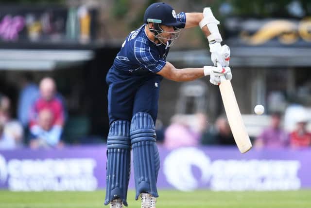 Kyle Coetzer plays a shot against Zimbabwe. The batsman was Scotlands top scorer with 61. Picture: SNS.
