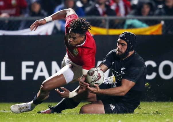 Anthony Watson and Charlie Ngatai of the Maori All Blacks compete for the ball. Picture: AFP/GETTY.