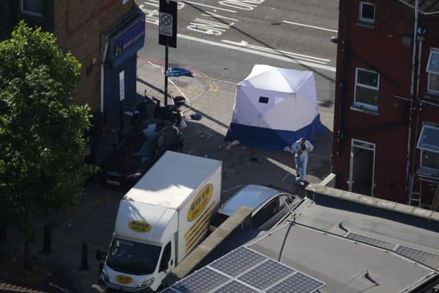 A forensic tent is erected at the scene in Finsbury Park area of north London after a vehichle hit pedestrians. Picture: Daniel leal-Olivas/Getty Images