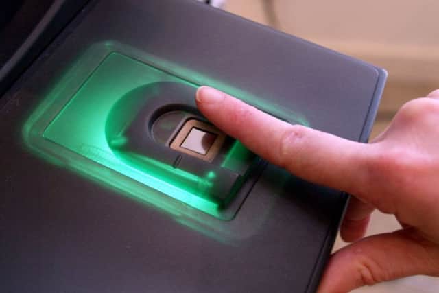Fingerprint recognition and other 'biometric' data can help to improve security. Picture: Martin Cleaver/AP