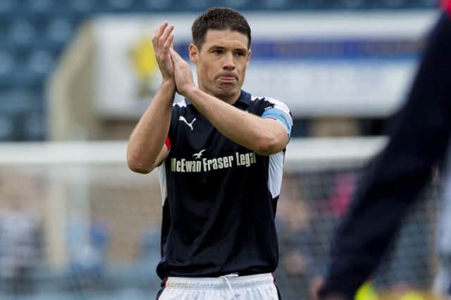 Dundee captain Darren O'Dea at full time. Picture: SNS
