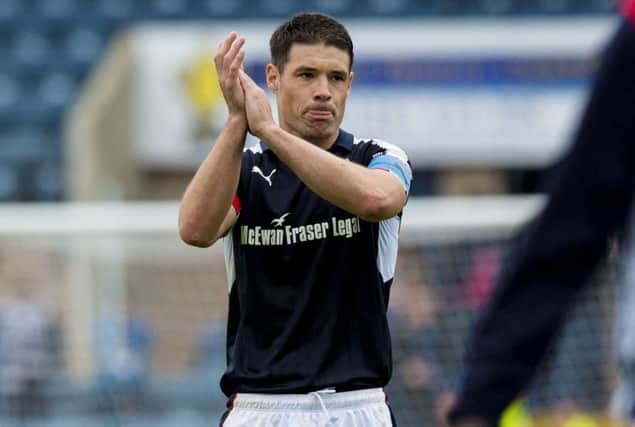 Dundee captain Darren O'Dea at full time. Picture: SNS