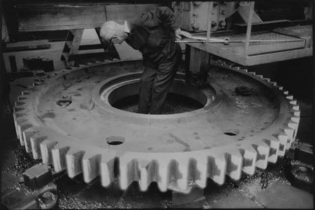John Hendry, a turner at Greenock-based engineers John G. Kincaid & Company, faces a wheel for a ship's main engine. Picture: Larry Herman