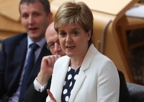 First Minister Nicola Sturgeon and Ruth Davidson have clashed over DUP deal. Picture: Andrew Milligan/PA Wire