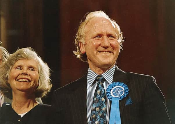 Bill Walker, with wife Mavis, was first elected in 1979