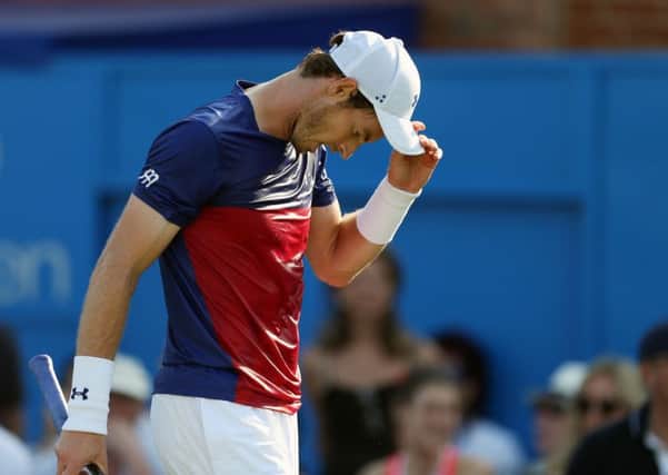 Andy Murray cuts a dejected figure during his defeat by Australia's Jordan Thompson at Queen's Club. Picture: Steven Paston/PA Wire