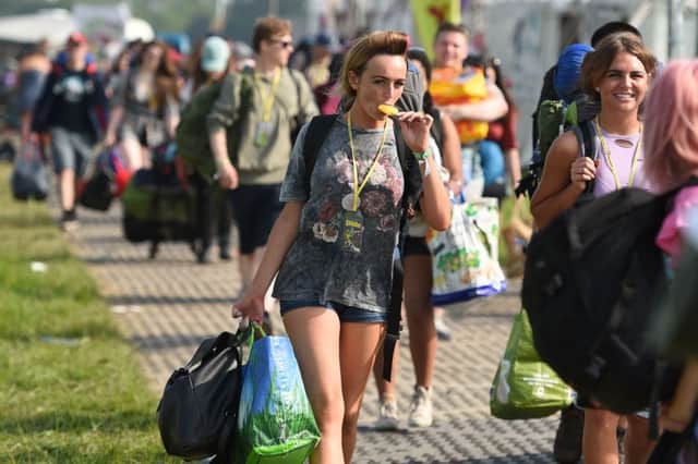 Revellers arrive for the Glastonbury festival amid a heatwave on Wednesday. Picture: Getty
