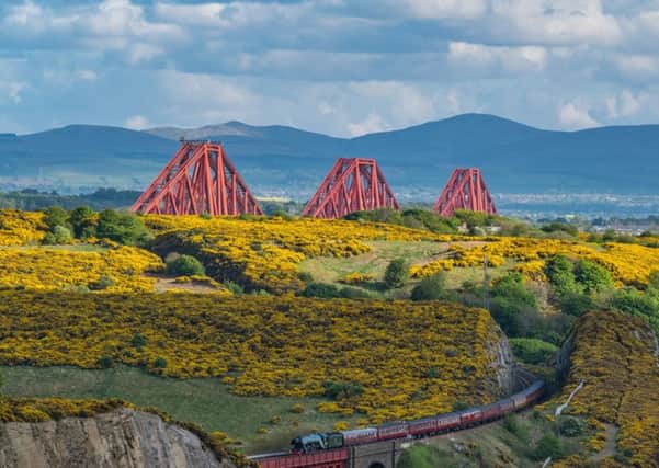Picture: the Flying Scotsman crossing the Forth Rail Bridge, contributed