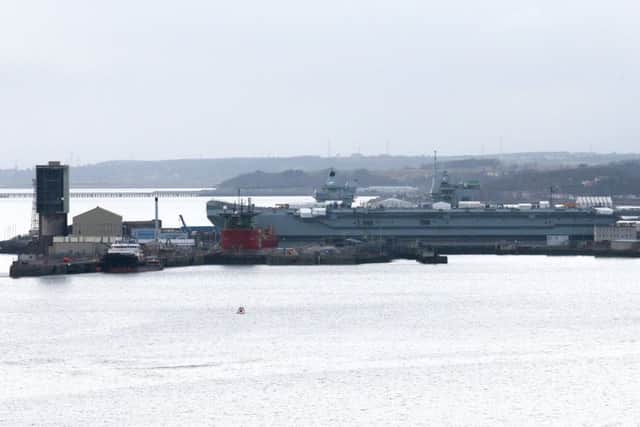 HMS Queen Elizabeth at Rosyth dockyard as viewed from the Queensferry Crossing. Picture: Andrew Milligan/PA Wire