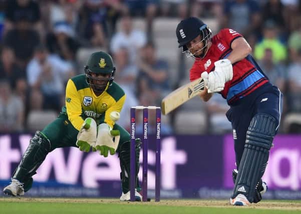 England's Jonny Bairstow plays a shot as South Africa's Mangaliso Mosehle keeps wicket during the T20 international at The Ageas Bowl in Southampton. Picture: Glyn Kirk/AFP/Getty