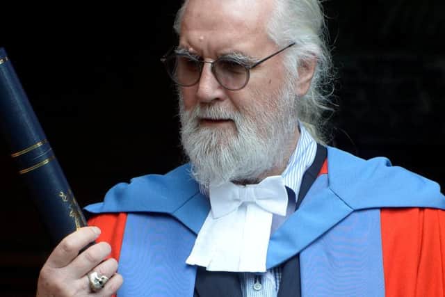 Billy Connolly outside Barony Hall receiving an honorary degree from the University of Strathclyde. Picture; SWNS