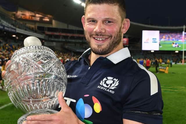 Edinburgh and Scotland hooker Ross Ford with the Hopetoun Cup after the 24-19 victory over Australia in Sydney in which he equalled Chris Patersons previous-record tally of 109 caps. Picture: David Gibson/Fotosport