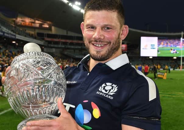Edinburgh and Scotland hooker Ross Ford with the Hopetoun Cup after the 24-19 victory over Australia in Sydney in which he equalled Chris Patersons previous-record tally of 109 caps. Picture: David Gibson/Fotosport