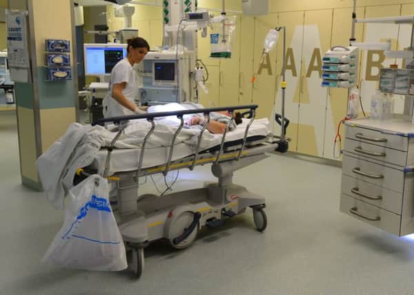 A nurse tends to a patient at the Unfallkrankenhaus Berlin (UKB) hospital in Marzahn district. Picture: Theo Heimann/Getty Images