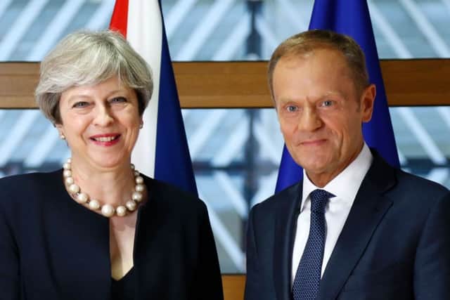 British Prime Minister Theresa May and European Council President Donald Tusk pose during a EU leaders summit in Brussels. Picture; Getty