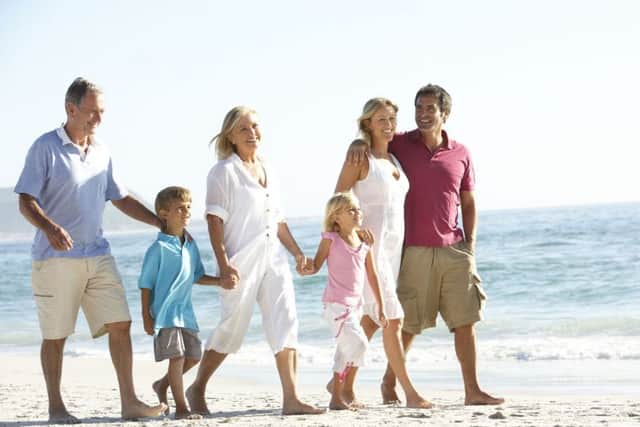Taking memorable trips away with the family is also a popular ambition among those aged in their 40s, 50s and 60s. Photograph: PA