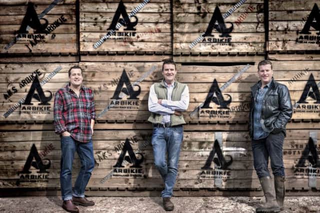 Brothers and co-founders of spirits maker Arbikie Iain, John and David Stirling at their distillery near Inverkeilor, north of Arbroath. Photograph: Chris Close