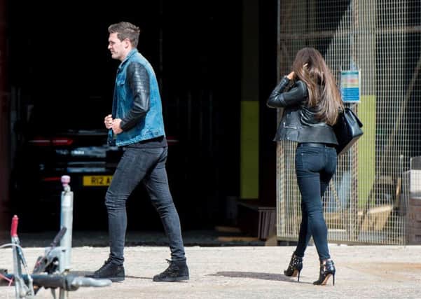 Kyle Lafferty arrives at Tynecastle with his wife Vanessa for talks with Hearts. Picture: Ross Parker/SNS