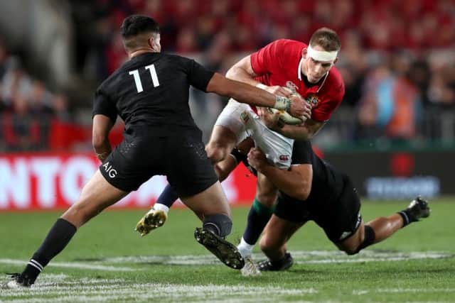 British and Irish Lions' Liam Williams tries to get past New Zealand's Rieko Ioane. Picture: David Davies/PA Wire.