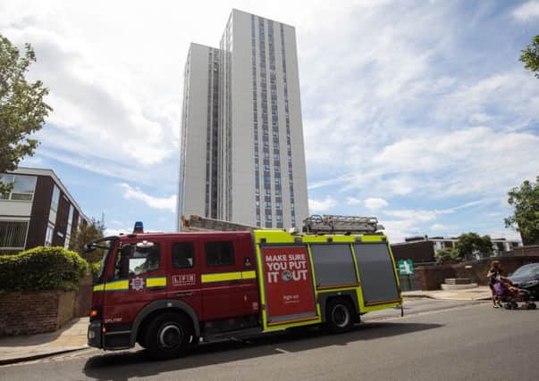 A fire engine sits outside the Bray residential block in the Chalcots Estate. Picture: AFP/Getty Images