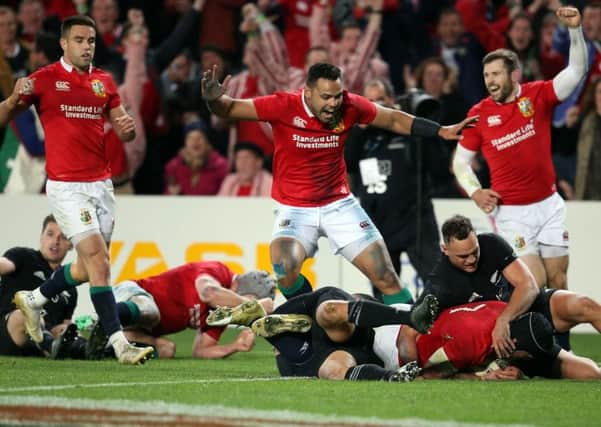 British and Irish Lions Sean O'Brien (R) dives over to score one of the greatest tries in Lions history. Picture: MICHAEL BRADLEY/AFP/Getty Images