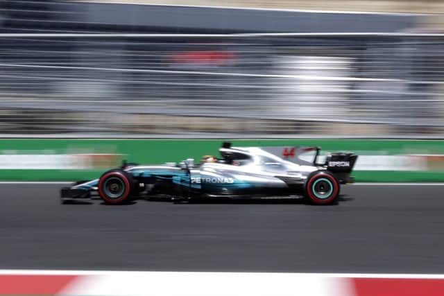 Mercedes driver Lewis Hamilton, a troubled man during Fridays practice, turned things around in Baku to take pole in the dying seconds of qualifying for the Azerbaijan Grand Prix. Photograph: Darko Bandic/AP