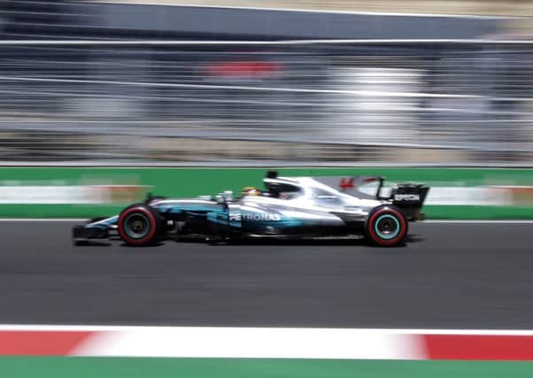 Mercedes driver Lewis Hamilton, a troubled man during Fridays practice, turned things around in Baku to take pole in the dying seconds of qualifying for the Azerbaijan Grand Prix. Photograph: Darko Bandic/AP