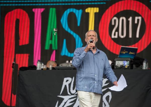 Britain's opposition Labour party Leader Jeremy Corbyn addresses the crowd from the Pyramid Stage at the Glastonbury Festival. Picture: Oli SCARFFOLI SCARFF/AFP/Getty Images