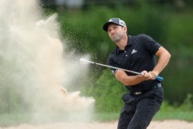 Sergio Garcia plays out of a bunker on his way to a 67 at Golfclub Munchen Eichenried. Photograph: Warren Little/Getty Images