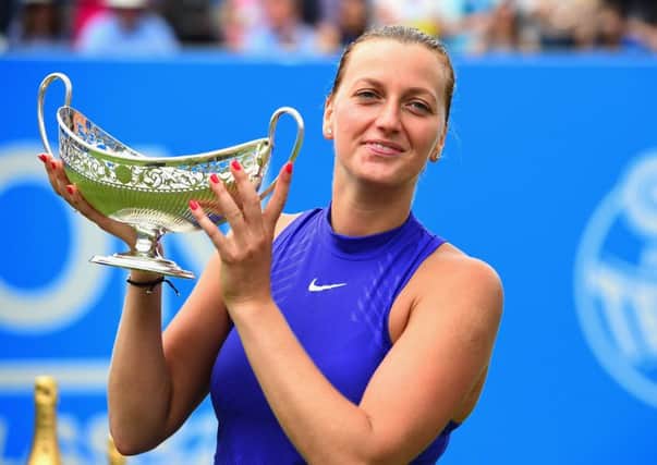 Petra Kvitova raises the trophy after winning the Aegon Classic title in Birmingham yesterday. Picture: Getty.