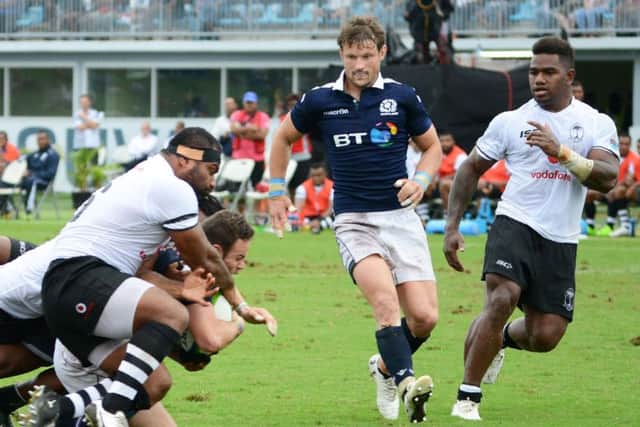 Ross Ford drives through the Fiji defence to score a try. Picture: Getty.