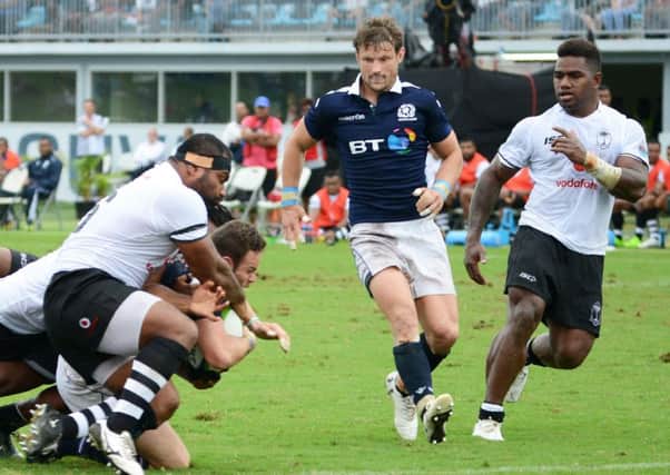 Ross Ford drives through the Fiji defence to score a try. Picture: Getty.