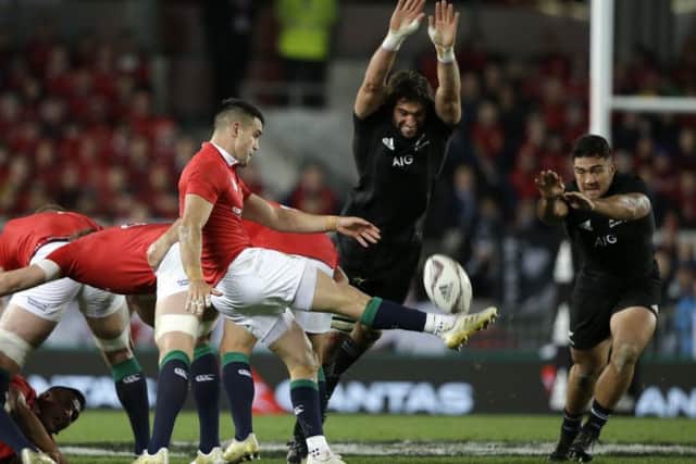 Conor Murray box-kicks during the first Test in Auckland on Saturday. Picture: AP.
