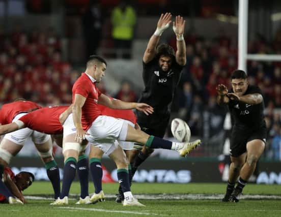 Conor Murray box-kicks during the first Test in Auckland on Saturday. Picture: AP.