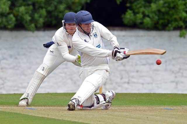 Glenrothes batsman Fred Culley sweeps during his innings of 56. Picture: Jon Savage Photography.