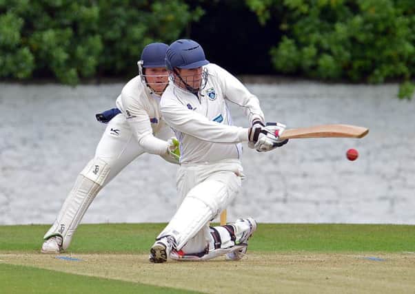 Glenrothes batsman Fred Culley sweeps during his innings of 56. Picture: Jon Savage Photography.