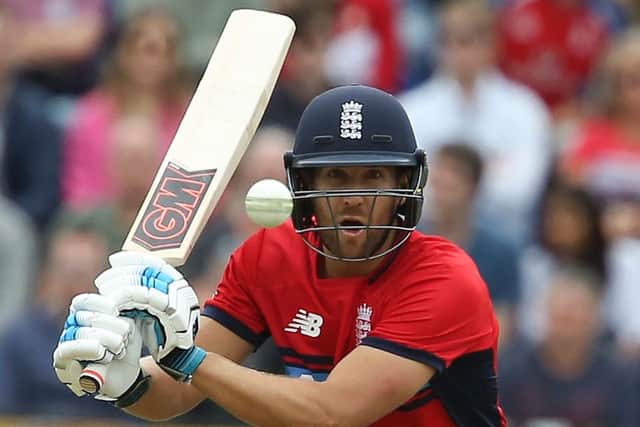 Dawid Malan has his eyes on the prize as he swings at a South African delivery. Picture: AFP/Getty.