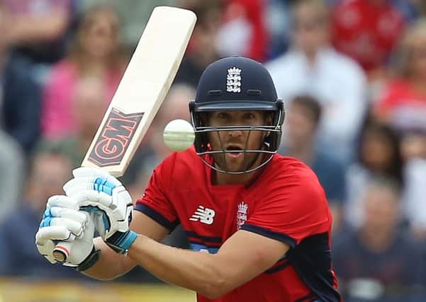 Dawid Malan has his eyes on the prize as he swings at a South African delivery. Picture: AFP/Getty.