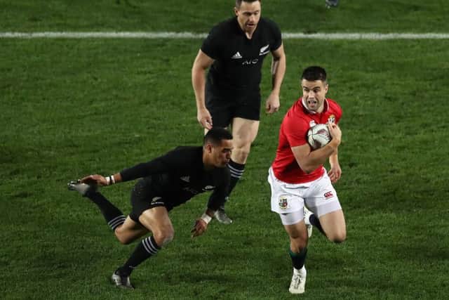 All Black Aaron Murray dives in to tackle Conor Murray in last Saturdays Test at Eden Park. Picture: Getty.