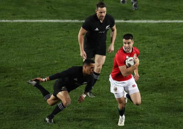 All Black Aaron Murray dives in to tackle Conor Murray in last Saturdays Test at Eden Park. Picture: Getty.