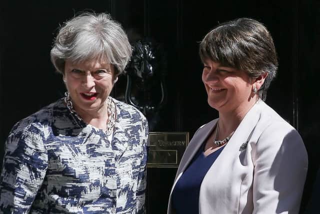 Britain's Prime Minister Theresa May poses for a picture with Democratic Unionist Party (DUP) leader Arlene Foster at 10 Downing Street. Picture: DANIEL LEAL-OLIVAS/AFP/Getty Images