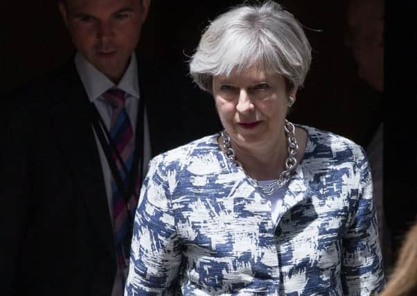 Britain's Prime Minister Theresa May leaves 10 Downing Street. Picture: DANIEL LEAL-OLIVAS/AFP/Getty Images