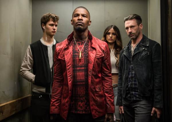 From left: Ansel Elgort as Baby, Jamie Foxx at Bats, Eiza Gonzalez as Darling and John Hamm as Buddy in the brilliant Baby Driver