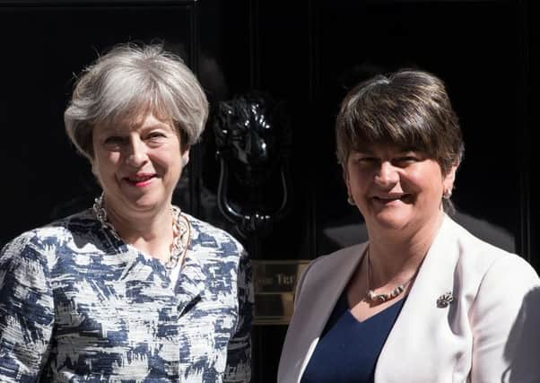 Theresa May greets Arlene Foster, the leader of Northern Ireland's Democratic Unionist Party in Downing Street. Picture: Getty