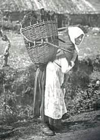 Woman with peat creel on Skye around 1890. www.ambaile.org.uk/J. Valentine & Co.