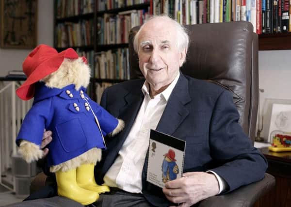 Michael Bond, pictured with his most famous creation, Paddington. Picture: PA