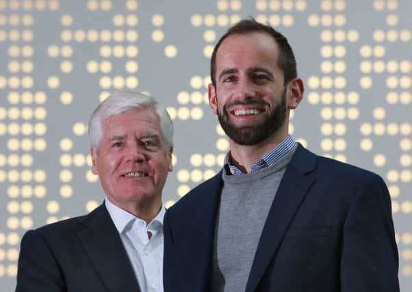 Sir Sandy Crombie, left, with Amiqus CEO Callum Murray. Picture: Stewart Attwood