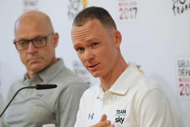 Chris Froome, right, and Sky team manager Sir Dave Brailsford during a press conference in Dusseldorf Picture: Christophe Ena/AP