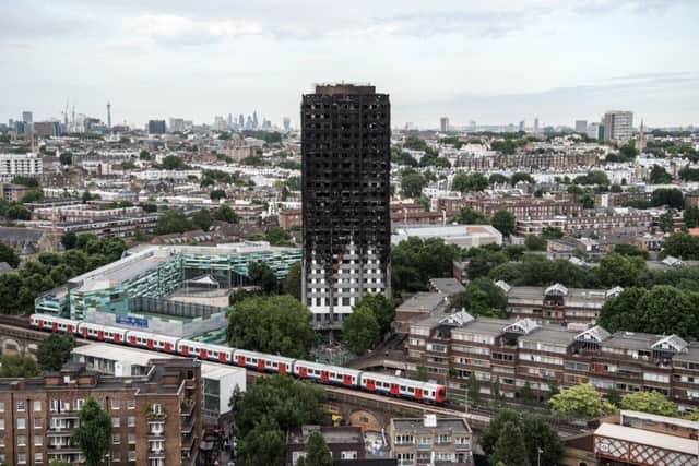 The remains of Grenfell Tower, seen from a neighbouring tower block. Picture: Getty Images