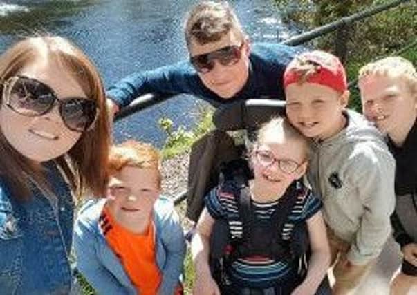Blaine, Scott, partner Laura, and their children enjoy a day out in the sun. Picture: Supplied